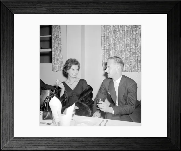Framed Print : Actress Sophie Loren seen here before the presentation of a life size cake of her self