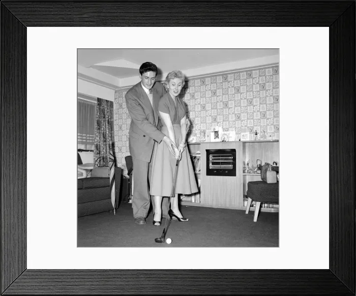 Framed Print : Actress and singer Jill Day seen here getting a golf lesson Circa 1957 Framed Print : Actress and singer Jill Day seen here getting a golf lesson Circa 1957