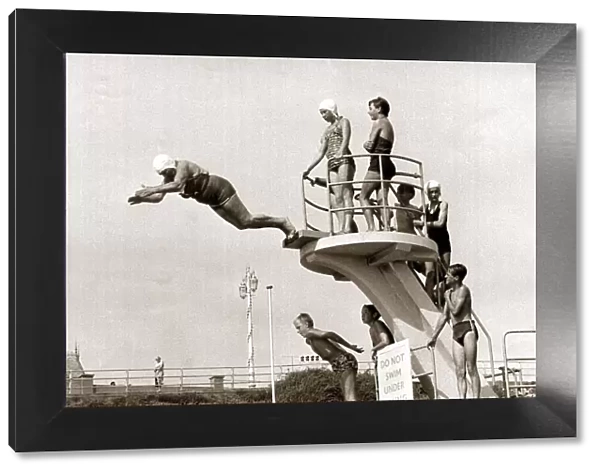 Taking The Plunge... 75 year old Molly Pendleton diving from a 16ft. 6in diving board