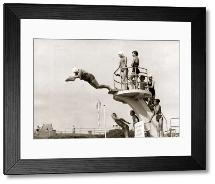 Framed Print : Taking The Plunge... 75 year old Molly Pendleton diving from a 16ft. 6in diving board Framed Print : Taking The Plunge... 75 year old Molly Pendleton diving from a 16ft. 6in diving board