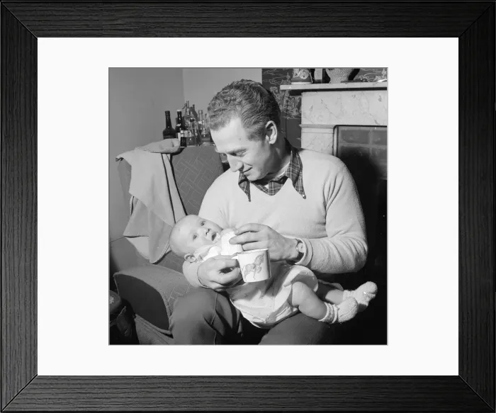 Framed Print : David Williams feeding one of his twins January 1957 Framed Print : David Williams feeding one of his twins January 1957