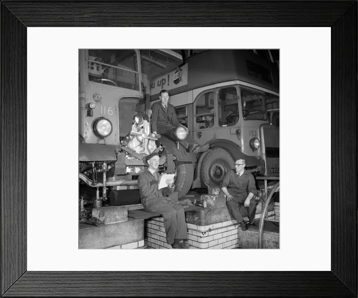Framed Print : London Transport mechanics seen here checking the engine of a Leyland bus Framed Print : London Transport mechanics seen here checking the engine of a Leyland bus