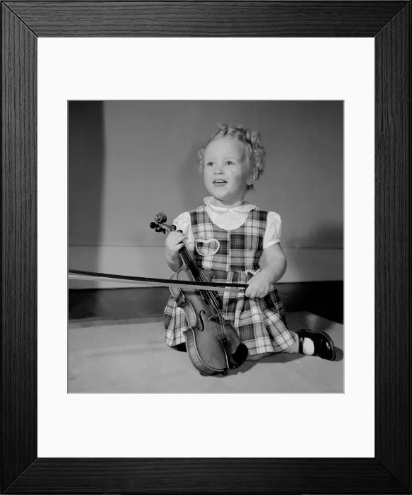 Framed Print : A small girl with her violin Circa 1957 Framed Print : A small girl with her violin Circa 1957