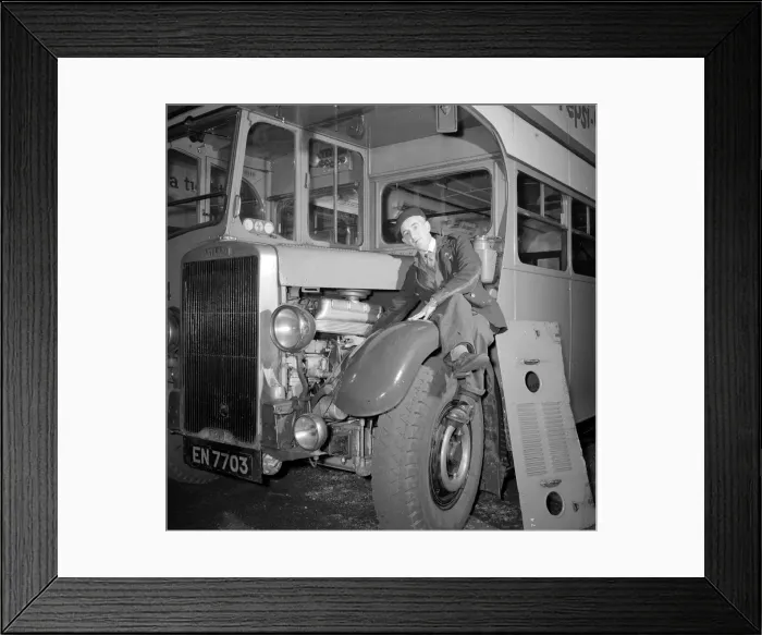 Framed Print : London Transport mechanic seen here checking the engine of a Leyland bus Framed Print : London Transport mechanic seen here checking the engine of a Leyland bus