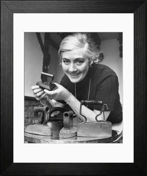 Framed Print : Bette Trotter collecting antique flat irons at the Stamford Cot pub near Alnwick Framed Print : Bette Trotter collecting antique flat irons at the Stamford Cot pub near Alnwick