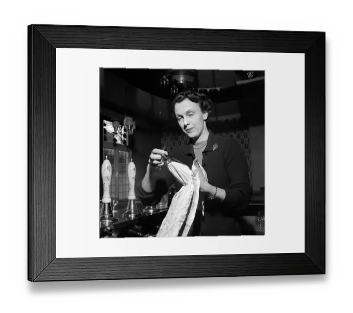 Framed Print : Mrs Hockey seen here working behind the bar of the Princess of Wales pub February 1957 Framed Print : Mrs Hockey seen here working behind the bar of the Princess of Wales pub February 1957