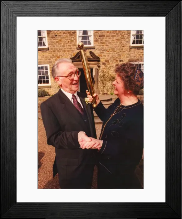 Framed Print : Elderly couples wedding. bride dressed in black dress