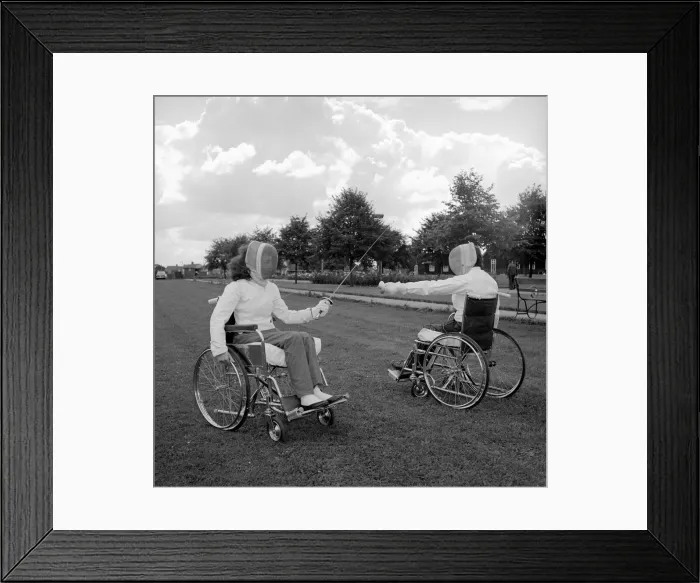 Framed Print : Two patients at the Stoke Manderville Hospital seen here fencing in the hospital grounds Framed Print : Two patients at the Stoke Manderville Hospital seen here fencing in the hospital grounds