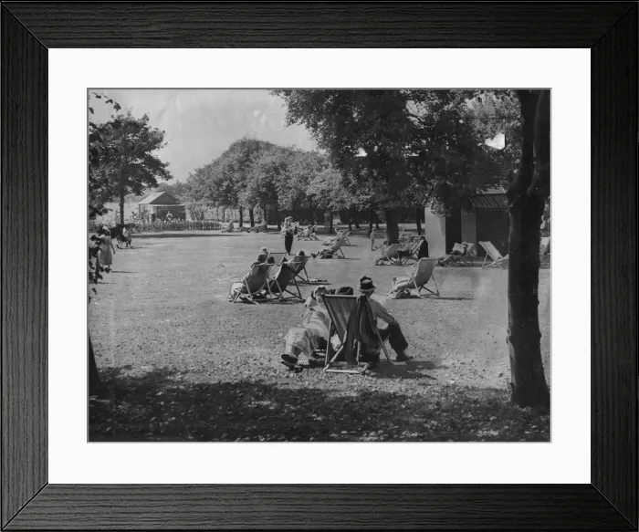 Framed Print : People relaxing in the summer sunshine at Exhibition Park in Newcastle