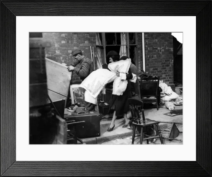 Framed Print : Householders salvage goods from a bombed area in Cardiff following a German air raid