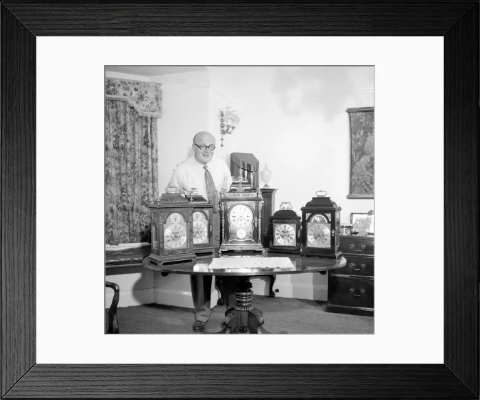 Framed Print : Peter Yorke, orchestra leader seen here with a collection of clocks June 1957 Framed Print : Peter Yorke, orchestra leader seen here with a collection of clocks June 1957