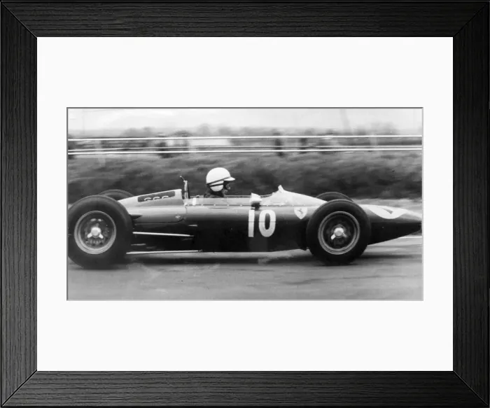 Framed Print : John Surtees on the Grandstand straight in his Ferrari. Silverstone practice race May Framed Print : John Surtees on the Grandstand straight in his Ferrari. Silverstone practice race May