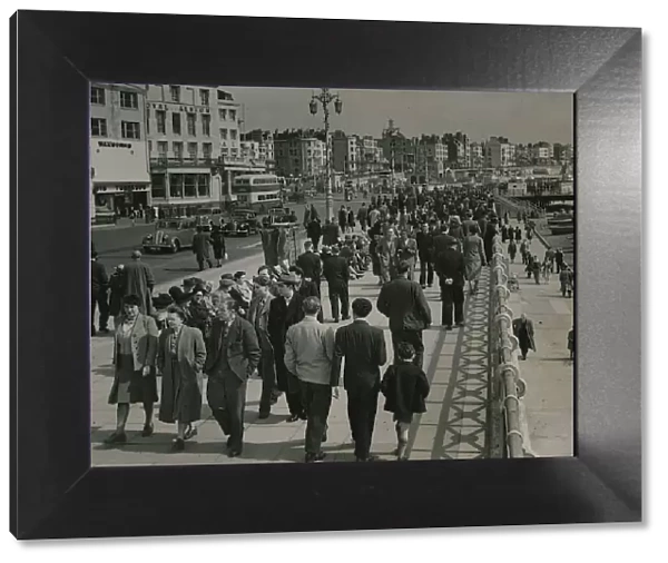 Crowd scene at Brighton April 1950 Sections of today