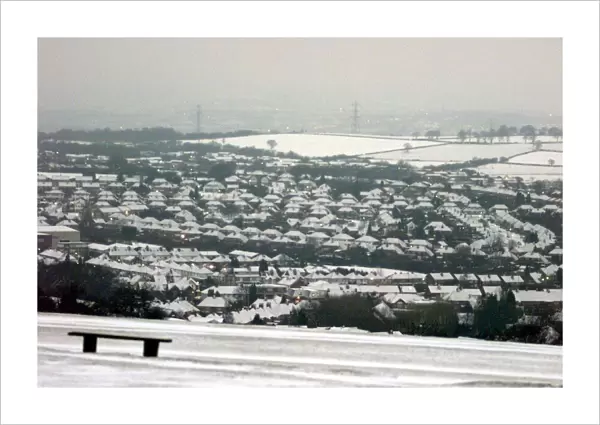 The Lickey Hills looking down over Rubery, houses covered by snow as the cold snap hits