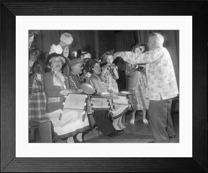 Framed Print : Pearly kings and queens play the washboard and other musical instruments during a concert Framed Print : Pearly kings and queens play the washboard and other musical instruments during a concert