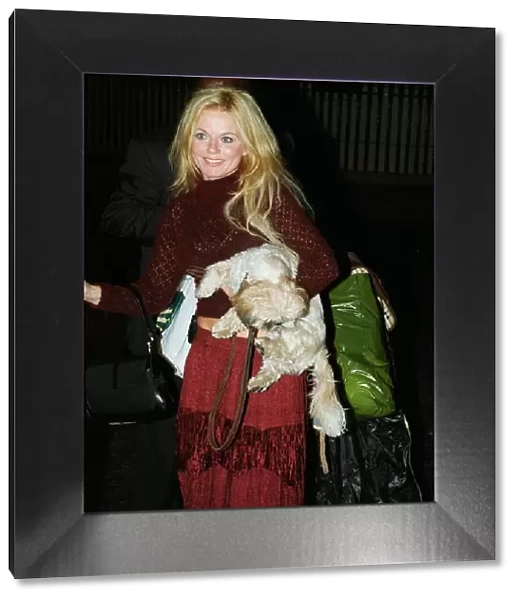 Geri Halliwell singer November 1999 with her dog Harry arrives at the house of