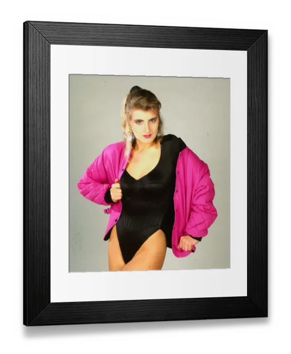 Framed Print : Jacket Fashion model wears pink padded bomber jacket April 1991 black bodysuit
