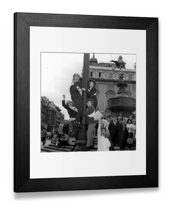 Framed Print : The Beatles 6 July 1964 Four fans up lamp post who are waiting to see The Beatles before