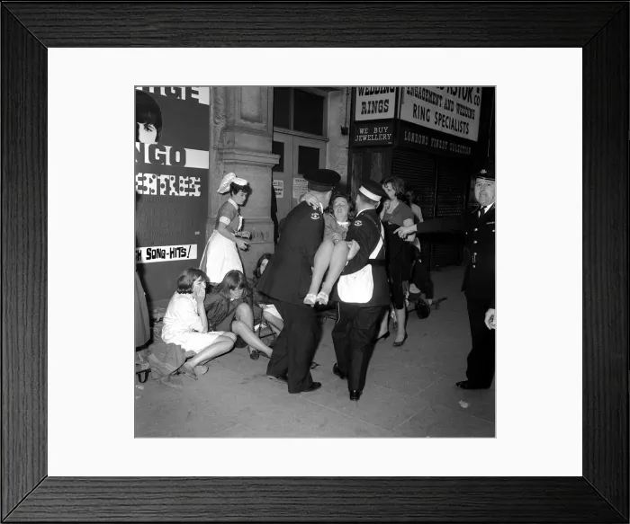 Framed Print : 6 July 1964 Police holding back crowds of fans, who are waiting to see The Beatles Framed Print : 6 July 1964 Police holding back crowds of fans, who are waiting to see The Beatles
