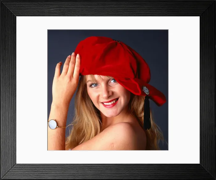 Framed Print : Hat Fashion Model wears red velvet hat November 1989 Framed Print : Hat Fashion Model wears red velvet hat November 1989