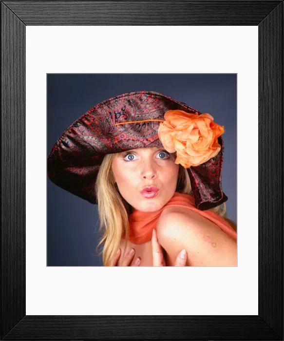 Framed Print : Hat Fashion Model wears Paisley patterned hat with orange flower November 1989