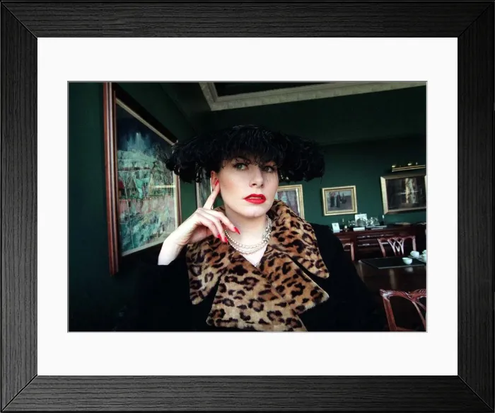 Framed Print : Evita Fashion Model sitting down black coat with leopard skin collar feather hat black Framed Print : Evita Fashion Model sitting down black coat with leopard skin collar feather hat black