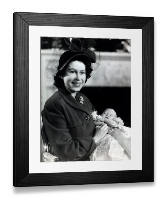 Framed Print : Princess Elizabeth holds her baby son Prince Charles in the drawing room at Buckingham Framed Print : Princess Elizabeth holds her baby son Prince Charles in the drawing room at Buckingham