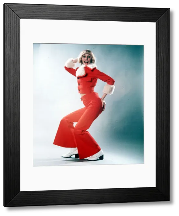 Framed Print : HELEN BRIDGEMAN WEARING A RED TROUSER SUIT Framed Print : HELEN BRIDGEMAN WEARING A RED TROUSER SUIT