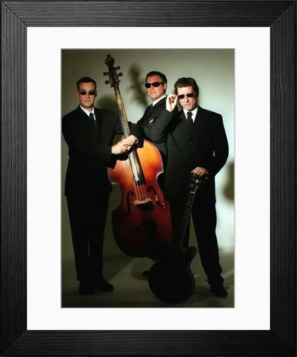 Framed Print : MEN IN BLACK FASHION. PIC SHOWS L-R MUSICIANS ROY PERCY