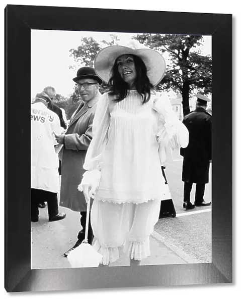 Janette Fraser in knickerbocker suit at Royal Ascot in June 1971 with parasol