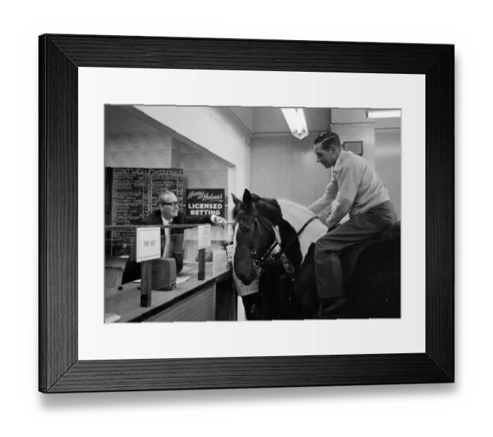 Framed Print : A member of the stables at Bramdean Riding School in London makes a farewell call on top Framed Print : A member of the stables at Bramdean Riding School in London makes a farewell call on top