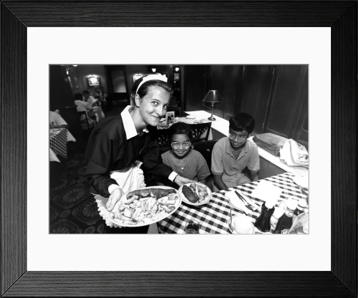 Framed Print : Waitress Georgina Bull serves Chinese kids chips at Ramsden Framed Print : Waitress Georgina Bull serves Chinese kids chips at Ramsden