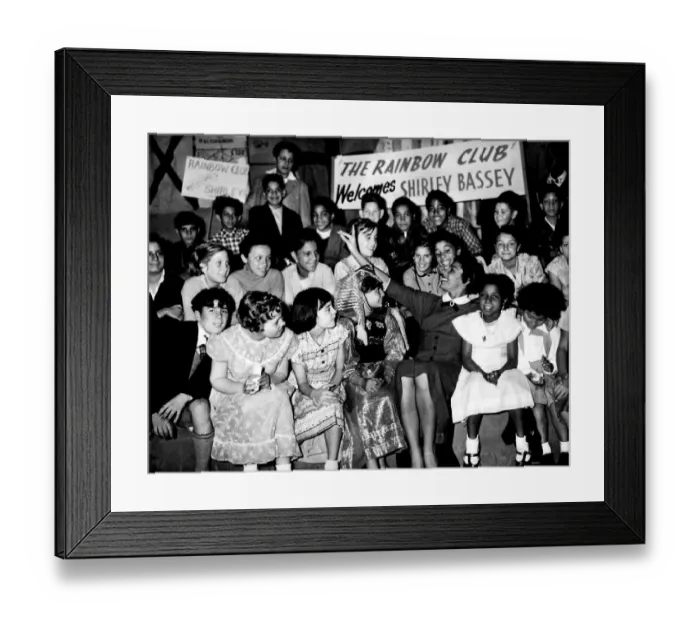 Framed Print : Shirley Bassey sings to members of the Bute Street Rainbow Club who welcomed her to Framed Print : Shirley Bassey sings to members of the Bute Street Rainbow Club who welcomed her to
