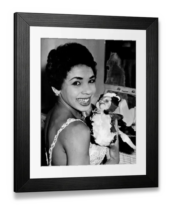 Framed Print : Sriley Bassey with her mascot Skunky'from Las Vegas pictured together in her Framed Print : Sriley Bassey with her mascot Skunky'from Las Vegas pictured together in her