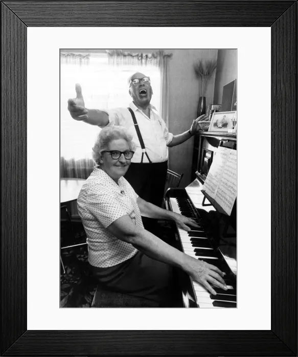 Framed Print : Old People - Jimmy Wallace sings away as he is accompanied by his wife Framed Print : Old People - Jimmy Wallace sings away as he is accompanied by his wife