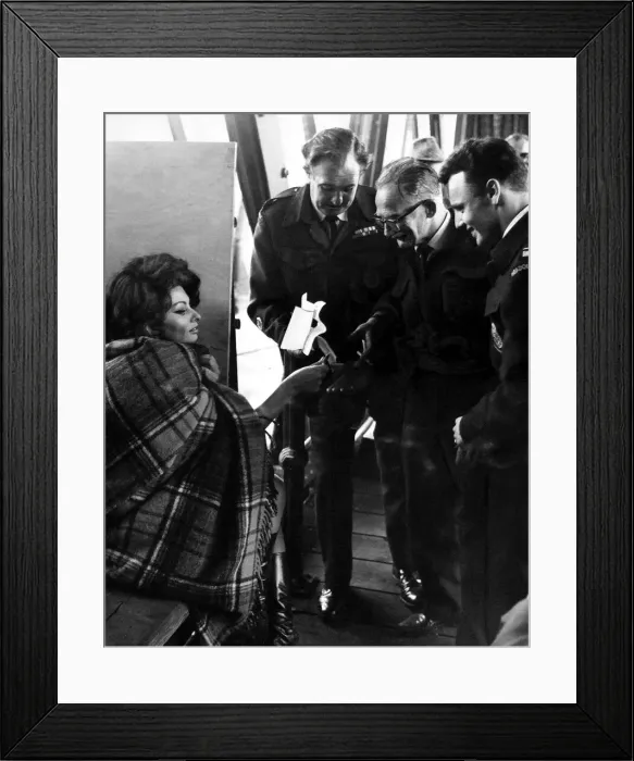 Framed Print : Italian film star Sophia Loren sign autographs during a break in filming for the film Framed Print : Italian film star Sophia Loren sign autographs during a break in filming for the film