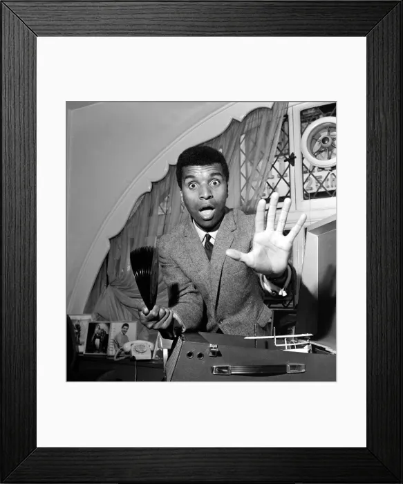 Framed Print : Singer and Comedian Kenny Lynch seen here with his latest record to gain entry into Framed Print : Singer and Comedian Kenny Lynch seen here with his latest record to gain entry into