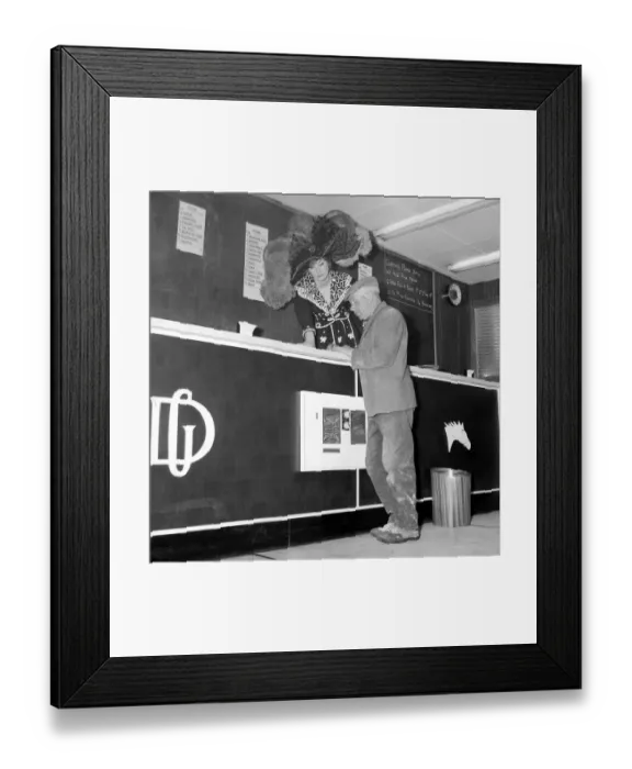 Framed Print : To celebrate the beginning of the Epsom meeting, bookmaker Gus Demmy decided to brighten