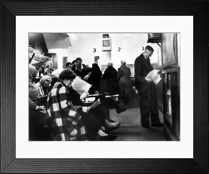 Framed Print : Punters placing their bets at the betting shop May 1958
