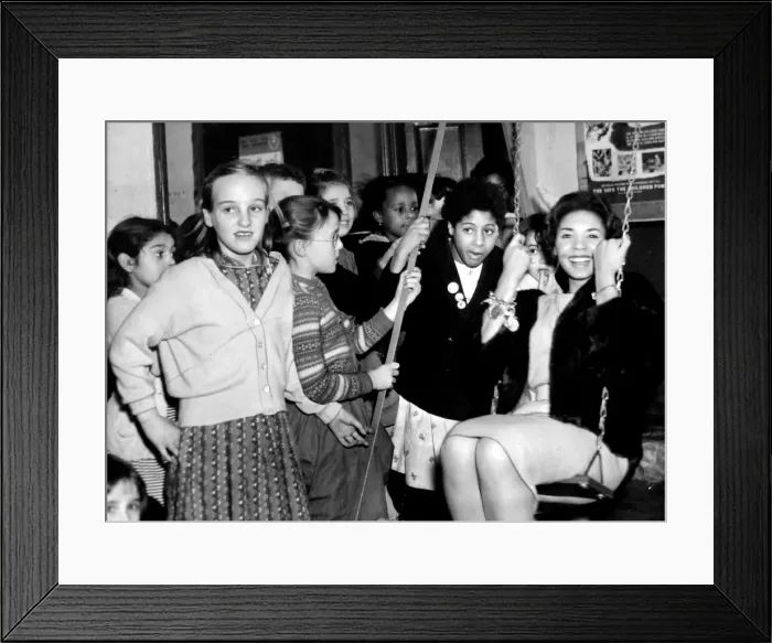 Framed Print : Welsh singing star Shirley Bassey pays a visit to the Rainbow Club, based in Bute Street Framed Print : Welsh singing star Shirley Bassey pays a visit to the Rainbow Club, based in Bute Street