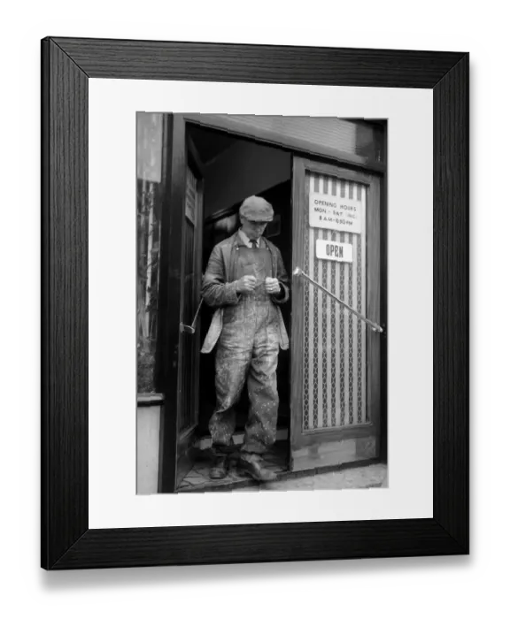 Framed Print : A punter leaves a betting shop in London after placing his bet May 1961 Framed Print : A punter leaves a betting shop in London after placing his bet May 1961