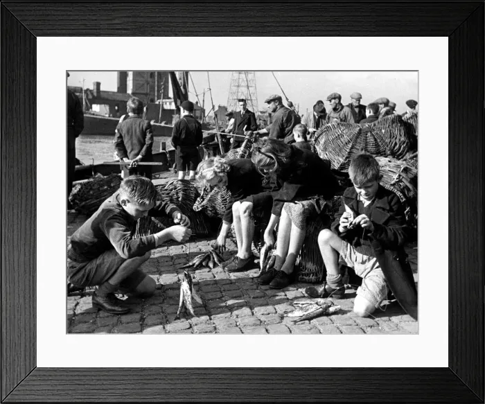 Framed Print : Prospective fishermen of England stringing their morning fry Framed Print : Prospective fishermen of England stringing their morning fry
