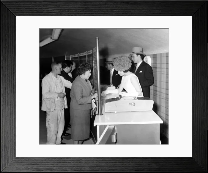 Framed Print : A touch of Ascot was brought to Manchester when the employees of Demmy betting shop of