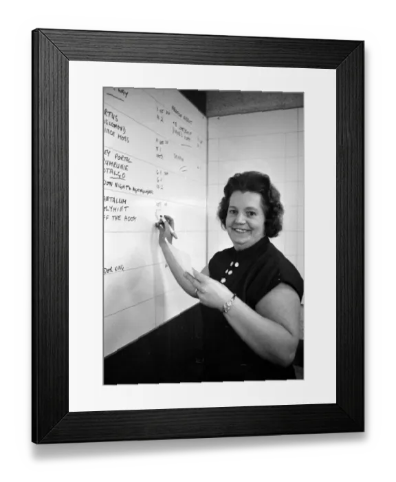Framed Print : Cashier Dorothy Penfold of a Ladies only betting shop in Worcester Framed Print : Cashier Dorothy Penfold of a Ladies only betting shop in Worcester