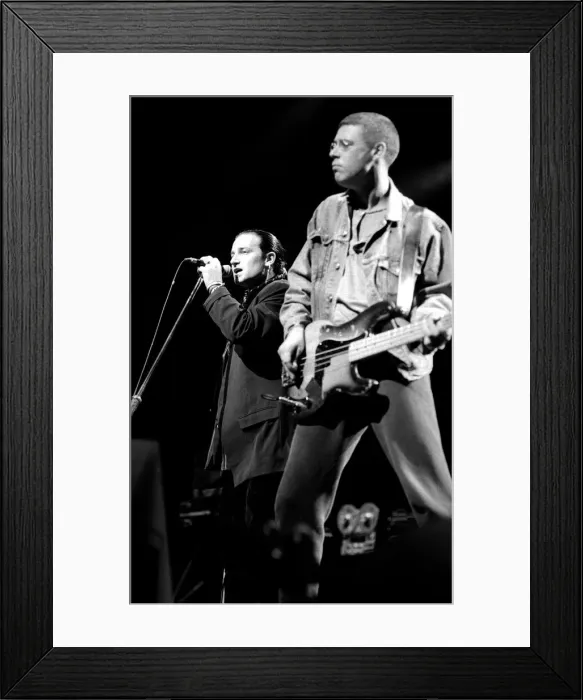 Framed Print : Rock group U2 in concert in USA - May 1987 Bono and Adam Clayton Framed Print : Rock group U2 in concert in USA - May 1987 Bono and Adam Clayton