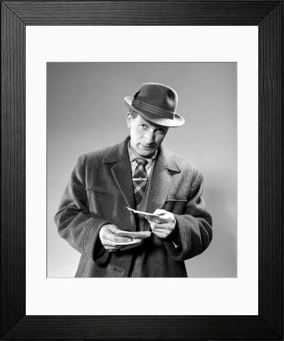 Framed Print : A punter holding his betting slips before placing his bet March 1963 Framed Print : A punter holding his betting slips before placing his bet March 1963