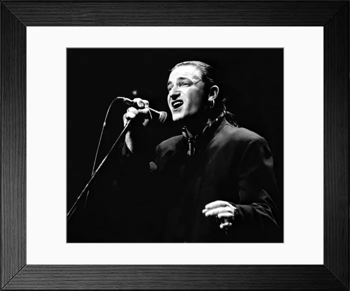 Framed Print : Rock group U2 in concert in USA - May 1987 Bono singing