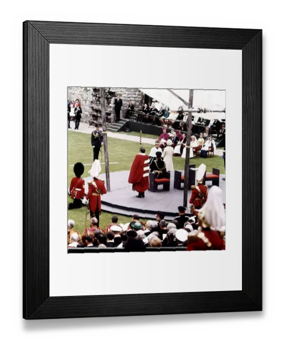 Framed Print : Investiture of Prince Charles as Prince of Wales 01  /  07  /  1969 Prince Charles kneels