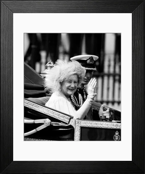 Framed Print : Queen Mother with Prince Charles waving as they ride in the Royal carriage Circa