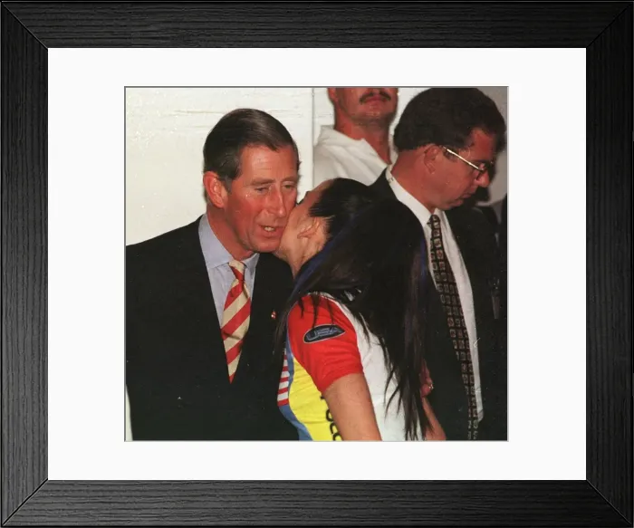Framed Print : Prince Charles gets a kiss from Spice Girl Mel C in Johannesburg Framed Print : Prince Charles gets a kiss from Spice Girl Mel C in Johannesburg